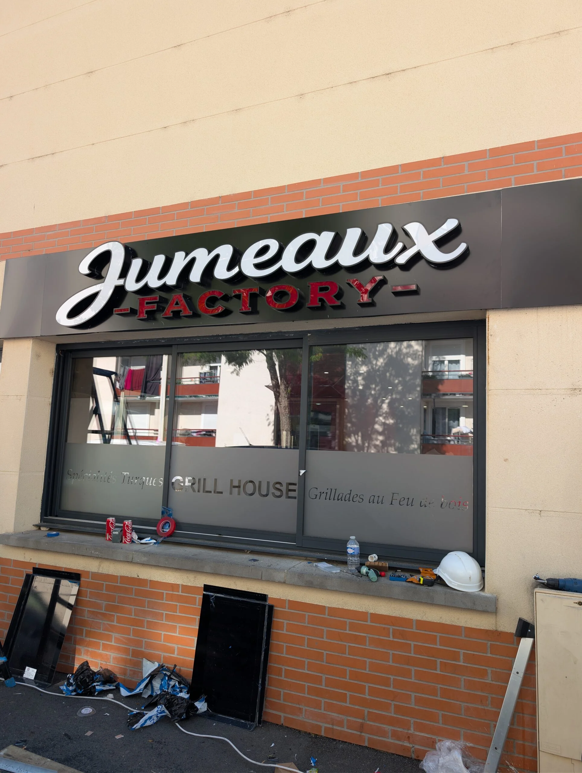 Enseigne de commerce Jumeaux Factory